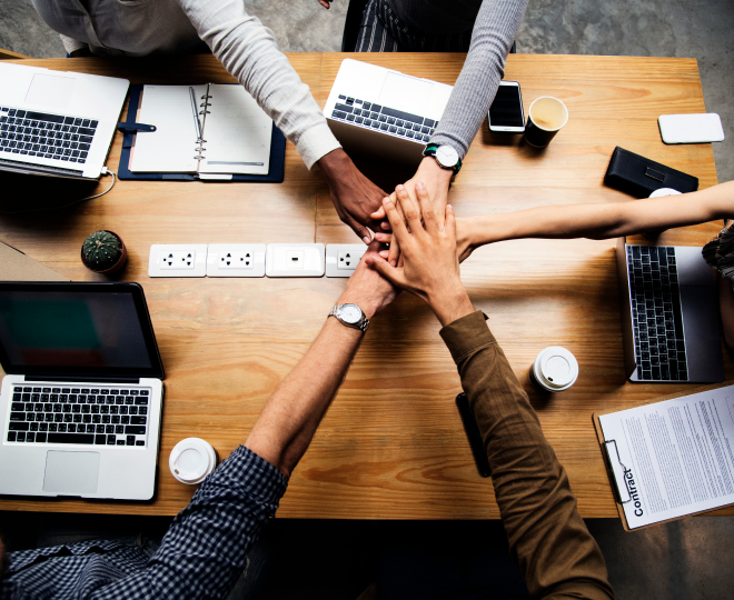 team-business-people-stacking-hands 2.png